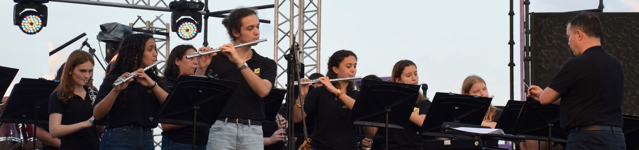 CMA wind ensemble performing together